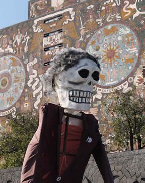 A well-dressed skeleton makes his way through UNAM