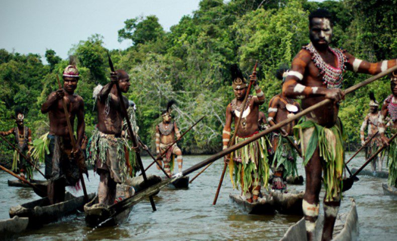 Image of people of Papua New Guinea navigating the Sepik River