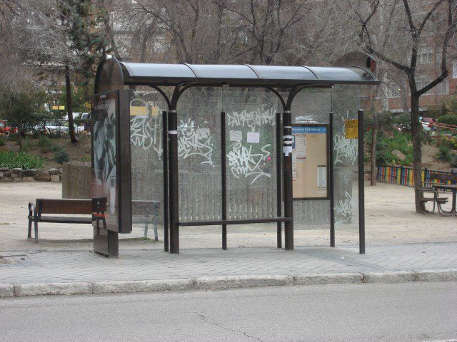 Image of an empty bus stop.