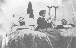 A Civil War nurse cares for sick and wounded soldiers of the Union Army