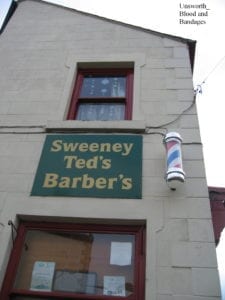 Barber shop displaying barber pole