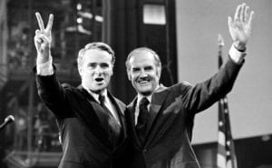 Photograph of Senator Thomas Eagleton (making peace sign) who was forced to withdraw after revealing he had been treated for depression with George McGovern (waving)