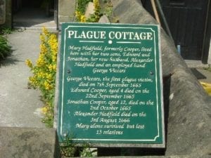 Plaque outside a cottage in Eyam