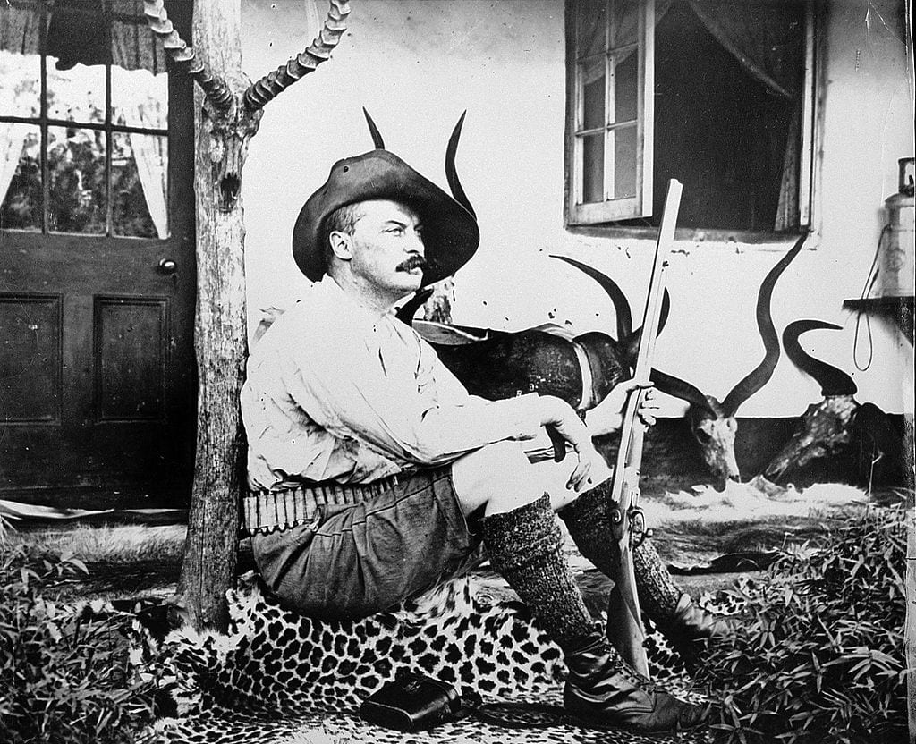Sir David Bruce on porch of his hut in Ubombo