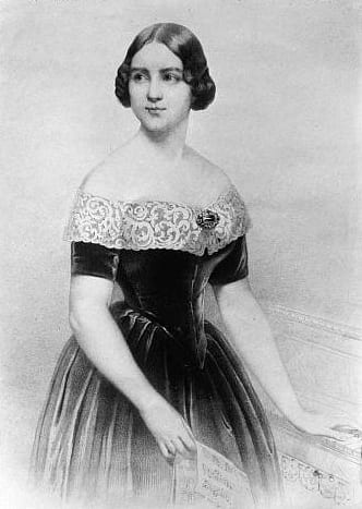 Jenny Lind standing at a keyboard