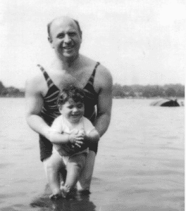 Oliver Sacks as a young child swimming with his father.