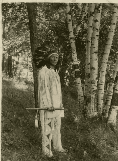 Portrait of Dr. Charles A. Eastman (Ohiyesa) in traditional Native dress
