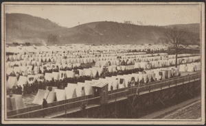 United States Civil War: Elmira prison. "Photograph shows rows of tents within stockade at Camp Rathbun, which was converted to a prison camp for Confederate soldiers in 1864."
